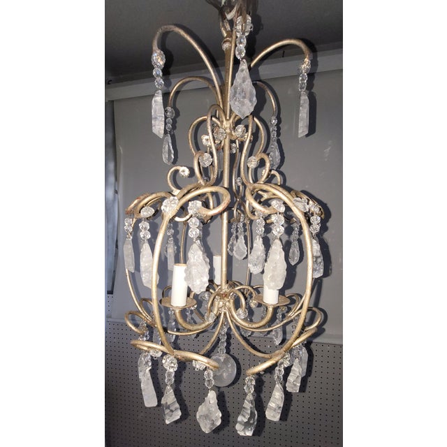Made by Mario Lighting Inc Petite 3-Light Iron Chandelier adorned with several Quartz crystal prisms with clear rosettes....