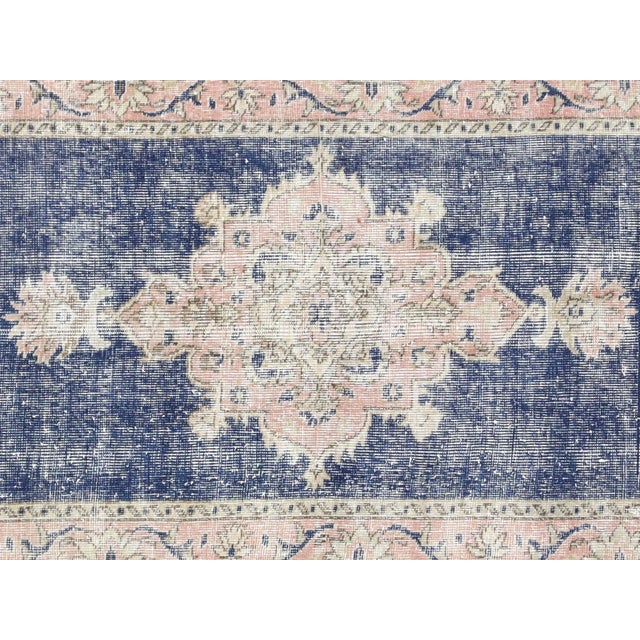 This Vintage Turkish Oushak Runner is the perfect way to add texture and antique flair to any living space. Crafted with...