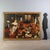 Oil on canvas from the early 17th-century Flemish school, depicting a lively interior scene of a large kitchen in a palace...