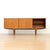 This vintage mid-century credenza was produced by Jentique Furniture during the 1960s. A wonderful minimalist design and...