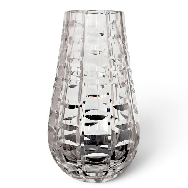 A late twentieth-century Waterford Crystal vase in the Tralee pattern, produced in Ireland and distinguished by its...