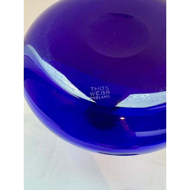 A stunning vintage liquor or wine decanter by the renowned English glassworks, Thomas Webb & Sons. This hand-blown piece...