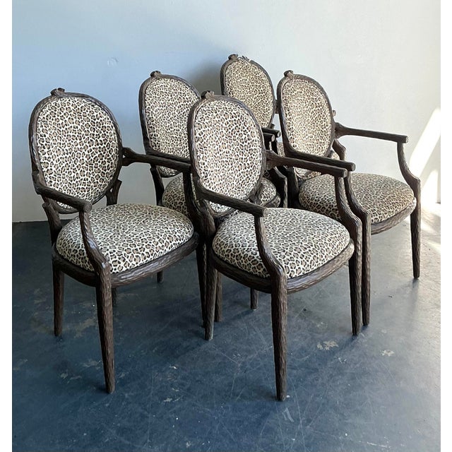 This striking set of five dining chairs is a masterful celebration of Hollywood Regency maximalism and the adventurous...