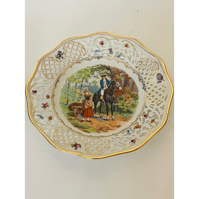 German Schumann Bavaria 20 th century porcelain plates with reticulated wide border and equestrian themes.