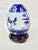 Lovely vintage blue and white egg. Comes on wooden stand. Features a floral design with gold detailing. Perfect to add to...