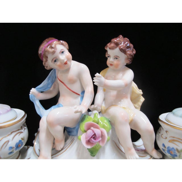 Vintage Sitzendorf figural inkwell or inkstand with 2 removable inserts. This elaborately detailed piece is crafted from...