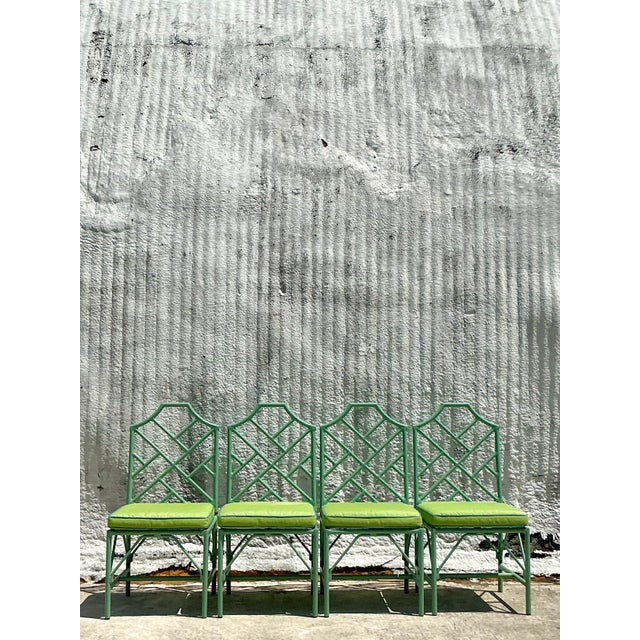 Channel breezy sophistication with this vintage dining set by O’Brien Iron Works, featuring the iconic Chinese Chippendale...