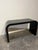 Mid Century Black Laminate Waterfall Console. Light scratches from normal use. 48w x 17.75d x 27.5h SKU 6-1044 DF