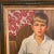 A very nice vintage oil on canvas painting portrait of a boy or young man with blonde hair 3/4 style with the family dog...