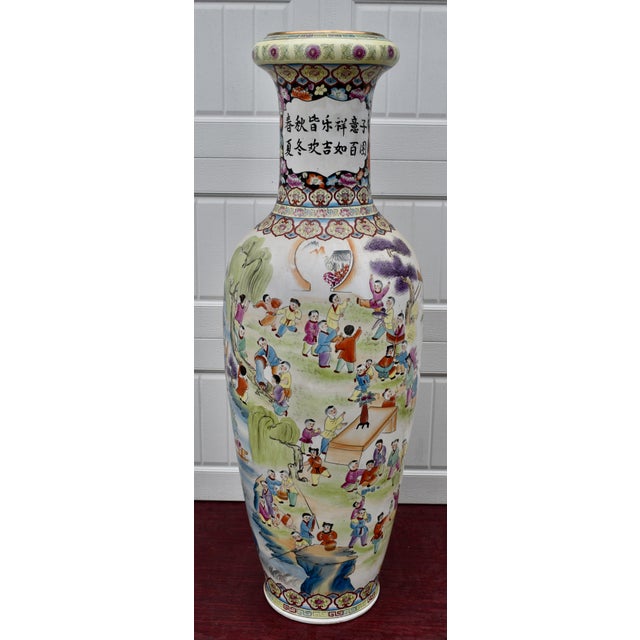Vintage (1960's) Floor Vase is Chinese. Painted: "100" Children Playing" - Multi-Colored. Very Heavy. The Measurements:...