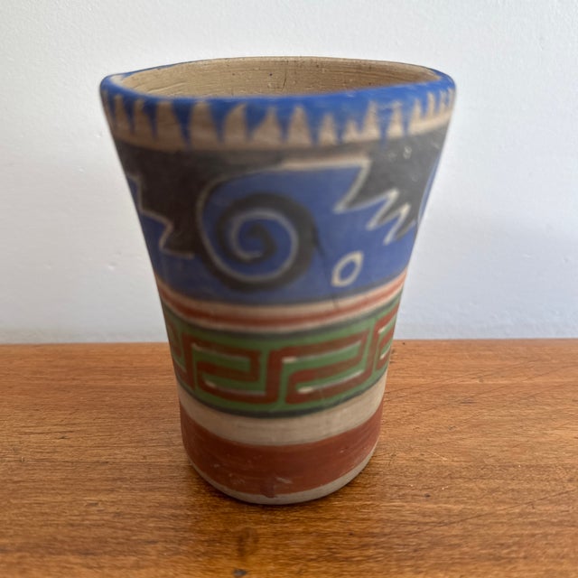 Clay pencil cup hand-painted in a Southwestern style. No maker's mark. Most items found at Pub & Oasis are vintage and...