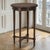 An elegant French Louis XVI style guéridon crafted from solid walnut, this diminutive round table has an exceptional...