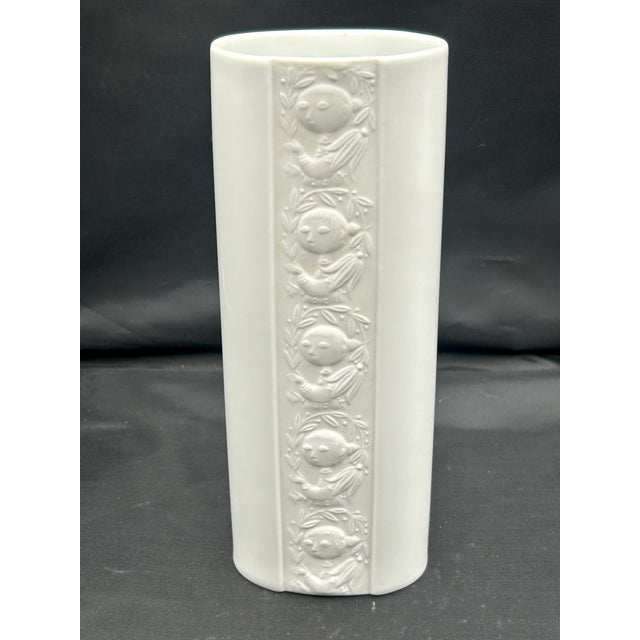 A white porcelain vase designed by Danish artist Bjørn Wiinblad for Rosenthal Studio-Linie, circa 1960s–1970s. A recessed...