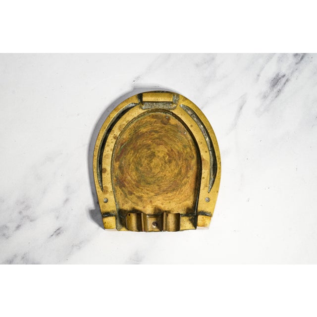 A handsome piece of 1930s metal ware with wonderful equestrian character, this substantial vintage ashtray is crafted from...