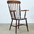 A handsome mid-19th century English Windsor chair built from solid elm and ash. This attractive chair has a high back with...