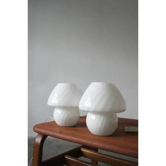 Mushroom-shaped lamps are a vintage style classic from the 1960s and 1970s. The acclaimed quality of glass adorns this...