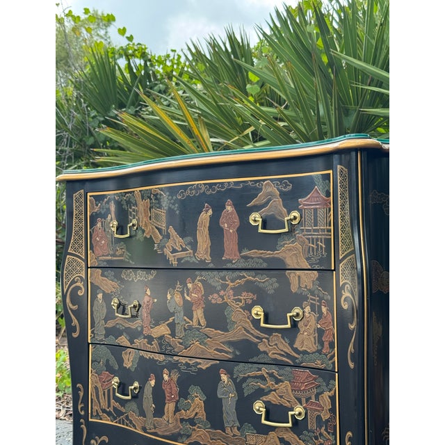 A fabulous vintage 1980s Drexel Heritage chinoiserie chest featuring an incredibly detailed black lacquer finish with...