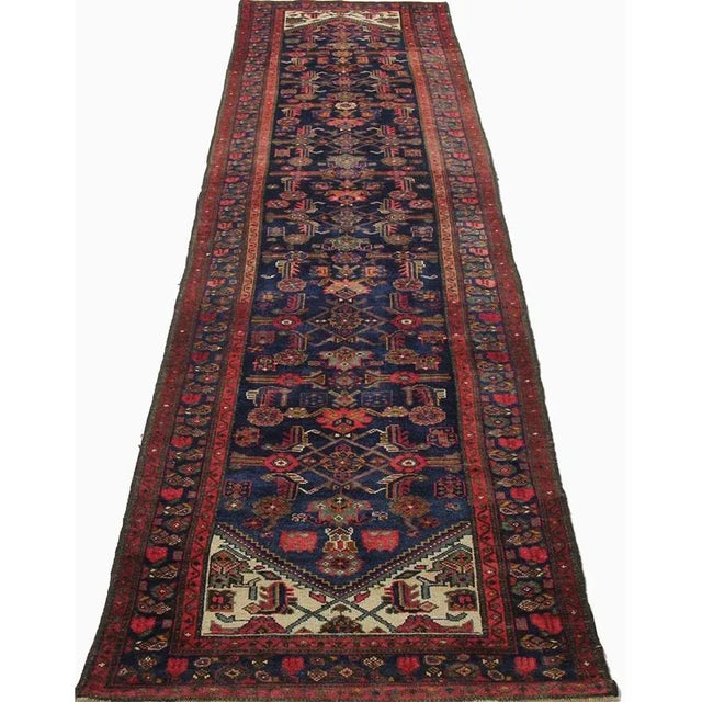 ACTUAL SIZE: 3’6″ x 16’0″ PRIMARY COLOR: Navy / Rust AGE: Old MATERIALS: Wool FOUNDATION: Cotton PRODUCTION: Handwoven,...