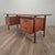 This executive floating desk is attributed to Kai Kristiansen and attributed to Feldballes Møbelfabrik, Denmark, dating to...