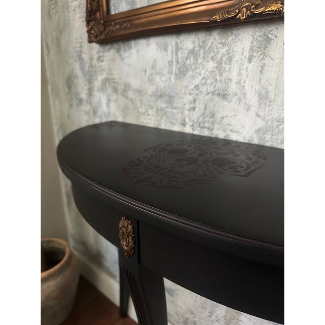 Not every piece announces itself. This one waits. This solid Ethan Allen demilune console has been completely transformed...