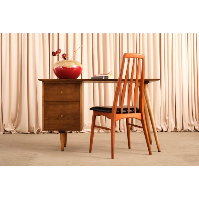 Designed by Niels Koefoed for Koefoeds Hornslet in Denmark, the Eva chair is one of the designer's most iconic designs....