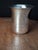 This vintage Jewish ritual Kiddush beaker is crafted from solid sterling silver, featuring a flared lip and classic...