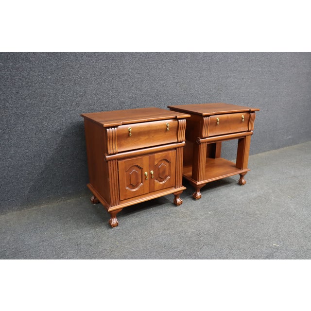 air of cherry wood nightstands by Dutch Designs of Ohio, crafted in a traditional Colonial Revival style. This matched set...