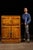Antique wooden ice box with original brass hardware. This piece features cabinet-style doors that latch in place to...