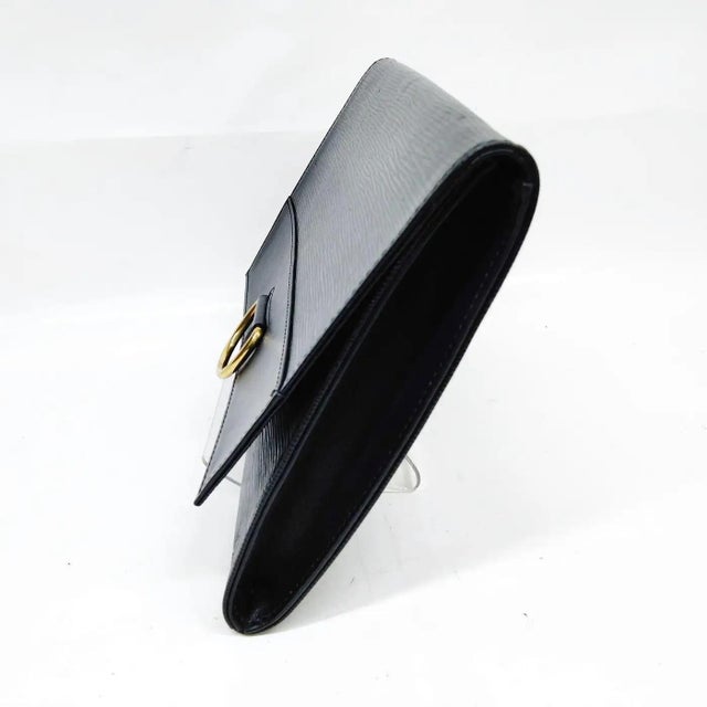This sleek Louis Vuitton Jena clutch bag is an elegant and minimalist evening accessory expertly crafted from the house's...