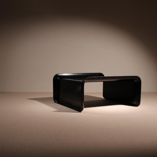 Description for sale is a minimalist black fiberglass coffee table, manufactured by rosenthal in germany in the 1970s. The...