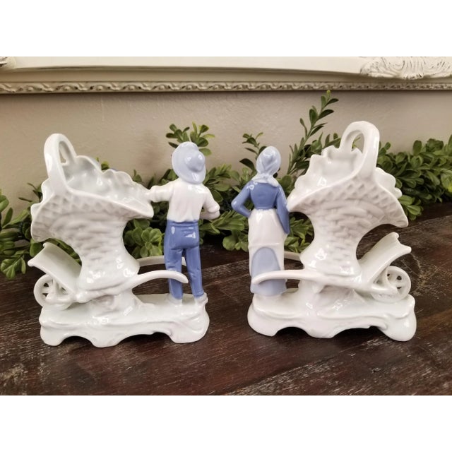 Pair 1920s Erphila Blue & White Porcelain Farmers With Large Basket Bud Vases on Wheelbarrows For Sale - Image 6 of 10