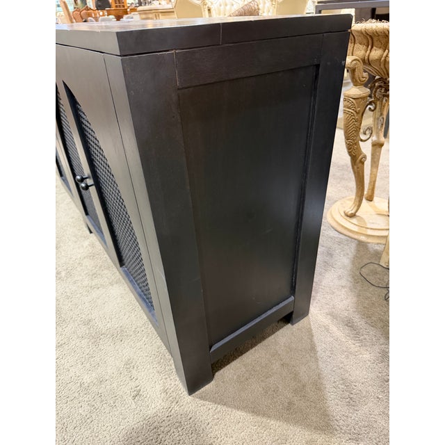 Sculptural simplicity meets refined craftsmanship in this stunning Four Hands “Tilda” Sideboard. Finished in a richly...