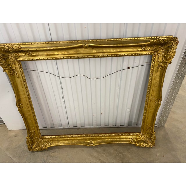 A fine gilt vintage painting frame. The frame boasts high quality gilding (gold) and exhibits a classic French style...