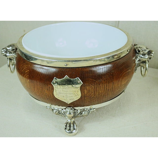 An extraordinary late 19th century English oak and Sheffield silver plate salad set. It is of exceptional quality with...