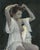Anastasia by Jane Radstrom | Oil Painting of a woman adjusting her hair in soft light For Sale