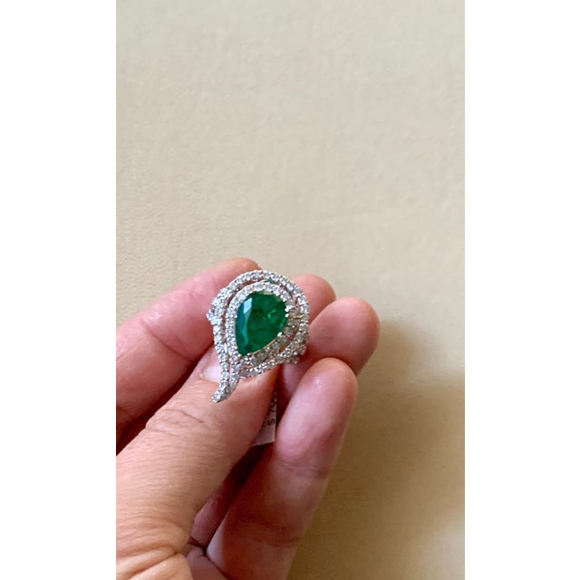 A classic, Cocktail ring approximately 3.93 Carat Colombian Emerald and Diamond Ring, Estate with no color enhancement....