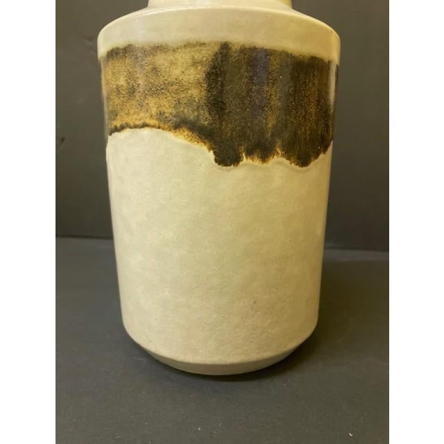 This striking mid-century modern studio pottery vase was designed by Alvino Bagni for Raymor in Italy during the 1960s....