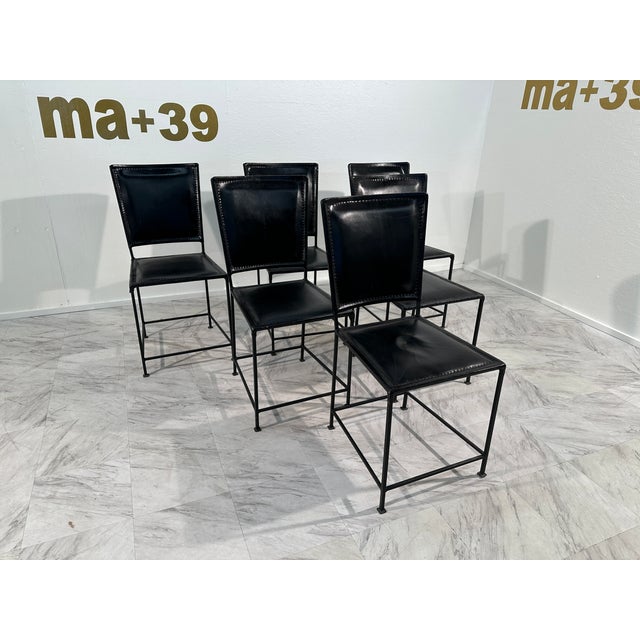 Set of 6 vintage Italian dining chairs from the 1970s, featuring a blend of leather and iron materials for a stylish and...