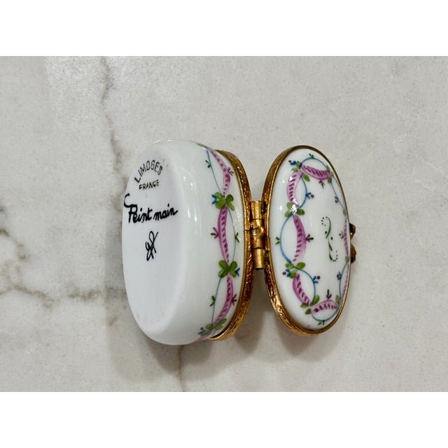 Vintage Limoges- Pink and Green Porcelain Trinket Box With Brass Bow Closure and Accents-Hand Painted For Sale - Image 9 of 10