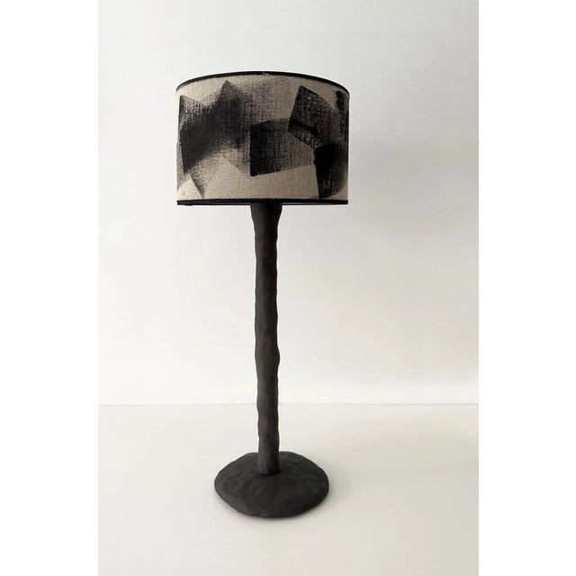 Abstract wood table lamp by atelier monochrome one of a kind. Materials: ceramic / sandstone. Dimensions: d 17 x h 60 cm...