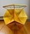 Dramatic "Iona" side table by the New York design house "Safavieh features very angular faceted reminiscent of the facets...