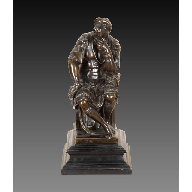 19th century french bronze figure of the seated lorenzo de medici, duke of urbino. Modelled in roman armour he is sat deep...