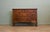 An early 20th century walnut sideboard, raised on elegant Queen Anne style cabriole legs and featuring figured burr walnut...