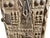 This vintage Dogon granary door from Mali features intricate carved relief figures—standing Nommo ancestors on the top and...