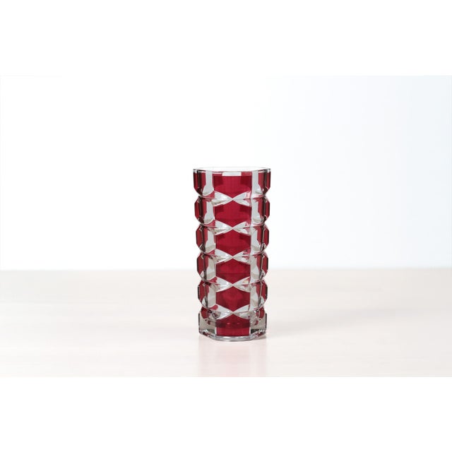 Vintage French crystal bud vase featuring ruby red glass cut through to clear crystal in a bold geometric diamond pattern....