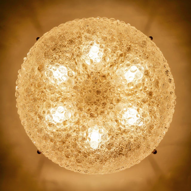 On offer is a large round ceiling or wall lamp in a luxury bubble glass design. The unique shape of the hand-blown murano...