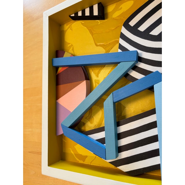 Very unique 3-D assemblage art piece entitled "Blue Ribbon" by Angela Chrusciaki Blehm, an American artist based in...