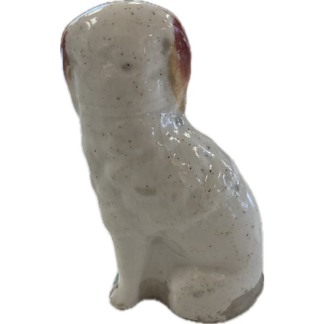 This single Staffordshire Terrier has lost its mate and is looking for a good home. Diminutive in size at only 3 1/2" high...