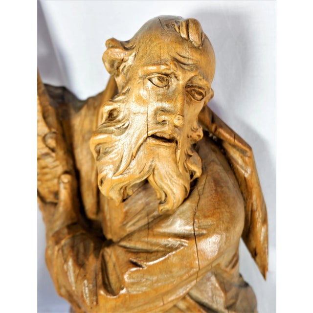 A large 18th Century antique German wood carved Santo wall hanging. I believe it may be Santo Andrew and was acquired by...