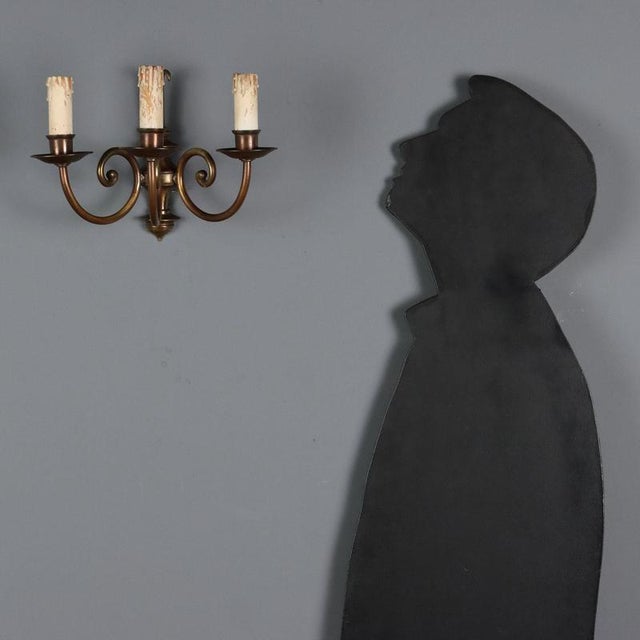 Pair of gilded bronze wall lamps. Three lights supported by curled arms. Italy, early 20th century. This piece is...